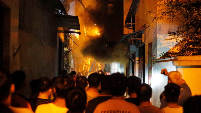 30 de morti si 50 de raniti intr-un incendiu izbucnit intr-un bloc din Vietnam. Cladirea nu avea iesire de urgenta Imagine