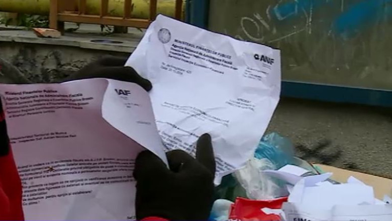 ANCHETA. Hartii cu informatii confidentiale, aruncate de Fiscul din Brasov la gunoi Imagine