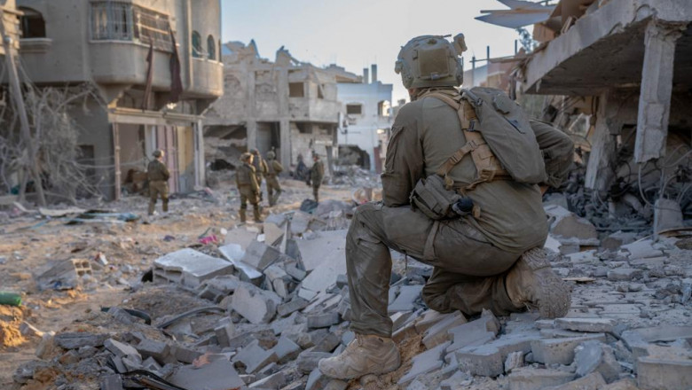 Armata israeliana, acuzata ca a deschis focul intr-o multime care astepta ajutoare umanitare. 9 oameni au fost ucisi Imagine