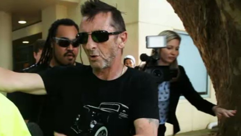 Bateristul trupei AC/DC, din nou in fata tribunalului. Phil Rudd este acuzat de amenintari cu moartea si posesie de droguri Imagine
