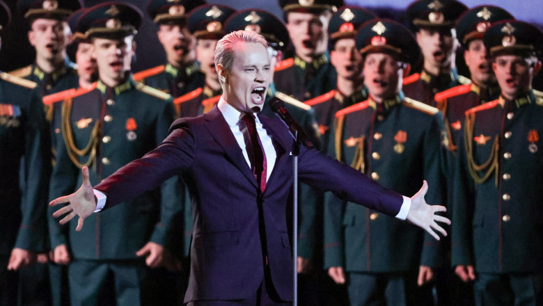 Cantaretul rus Shaman a folosit AI pentru a include opozanti notorii ai Kremlinului intr-un cor patriotic. „Canta pe gratis”