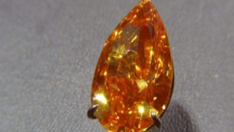 Cel mai mare diamant portocaliu din lume, scos la licitatie pentru 20 de milioane de dolari Imagine