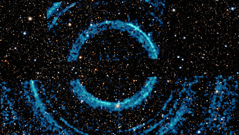 Cum suna o gaura neagra? NASA a publicat un clip audio cu undele sonore emise din centrul unui roi de galaxii Imagine