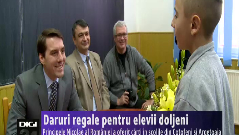 Daruri regale pentru elevii doljeni. Principele Nicolae al Romaniei a oferit carti in scolile din Cotofeni si Argetoaia Imagine