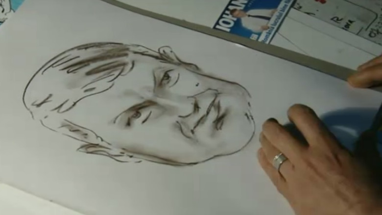 Desenul campaniei lui Klaus Iohannis, schitat de un caricaturist, cu mana stanga Imagine