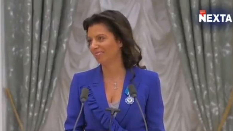 Discurs halucinant la Kremlin. Cu zambetul pe buze, propagandista sefa ii spune lui Putin ca il va ajuta „sa ii extermine pe canibali” Imagine