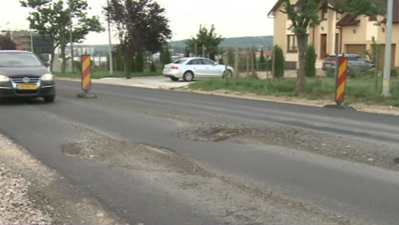 DN 76, refacut de mantuiala. La nici doua saptamani de la prima asfaltare au aparut gropi si denivelari Imagine