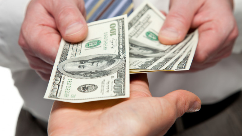 Dolarul a scazut dupa ce Rezerva Federala a SUA a redus dobanda de referinta Imagine