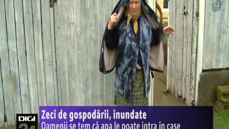 Dolj. Zeci de gospodarii din Motoci au fost inundate. Oamenii se tem ca apa le poate intra in case Imagine