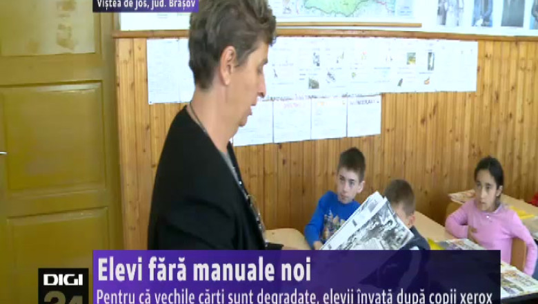 Elevi fara manuale noi. Pentru ca vechile carti sunt degradate, elevii invata dupa copii xerox Imagine