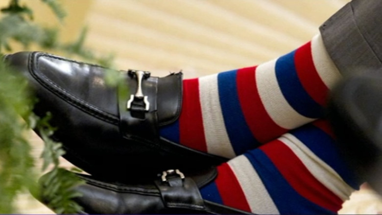 George Bush senior a donat o pereche de sosete in scopuri umanitare Imagine