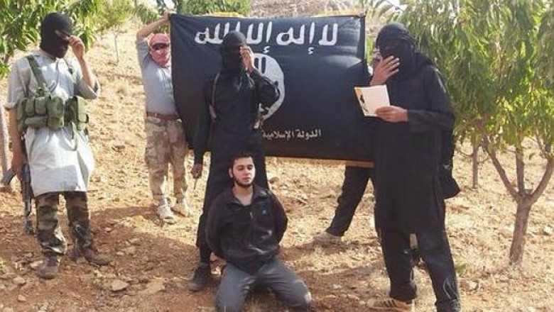 Gruparea Statul Islamic a decapitat un al patrulea prizonier Imagine