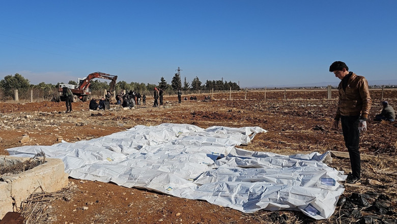 Guvernul Assad a mutat in secret zeci de mii de cadavre dintr-o groapa comuna pentru a-si ascunde crimele de razboi (Reuters) Imagine