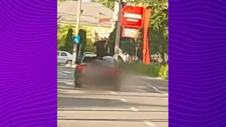 Imagini revoltatoare. Barbati cu un pistol pe care il indreptau spre trecatori si alti soferi, filmati pe capota unei masini (VIDEO) Imagine