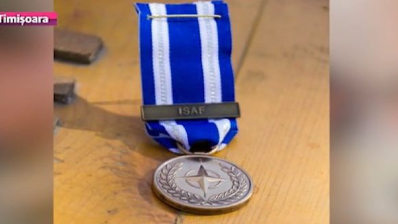 Intors din misiune, din Afganistan. Un ofiter al Gruparii Mobile de Jandarmi Timisoara, medaliat cu distinctia NATO-ISAF Imagine