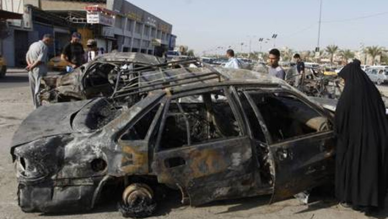 IRAK. Zece masini-capcana au explodat la Bagdad. Cel putin 65 de oameni au murit Imagine