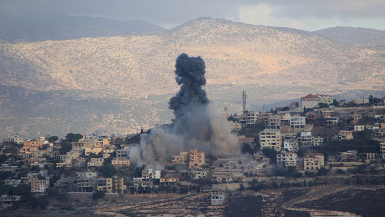 Israelul a trimis trupe suplimentare in sudul Libanului, Hezbollah a lansat 100 de rachete spre orasele israeliene Imagine