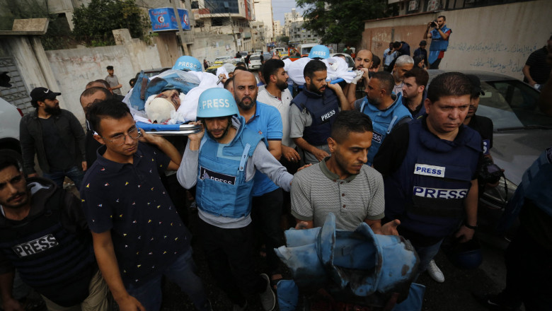 Israelul acuza jurnalisti din Gaza ca ar fi stiut de masacrul Hamas si intreaba publicatiile cum au ajuns ei sa faca fotografii Imagine