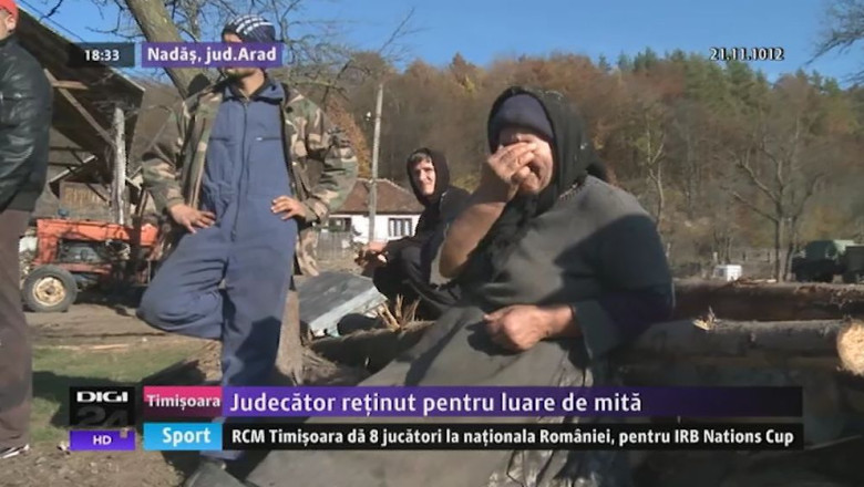 Judecator retinut pentru luare de mita. A fost retrocedat... un sat intreg Imagine