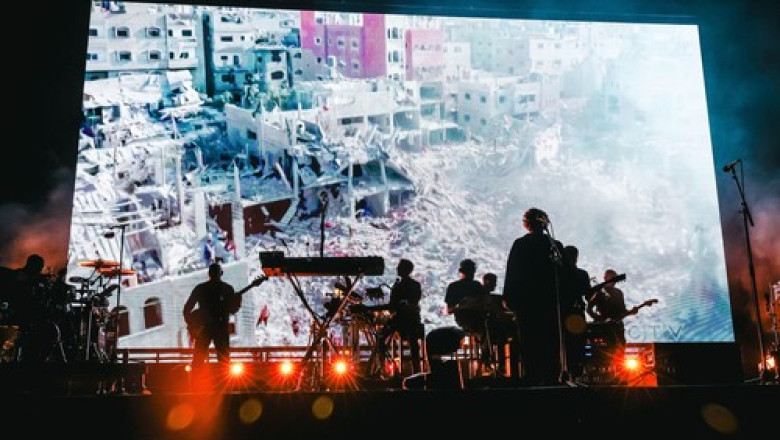 Massive Attack isi retrage muzica de pe Spotify in semn de protest fata de investitia CEO-ului in domeniul AI militara Imagine