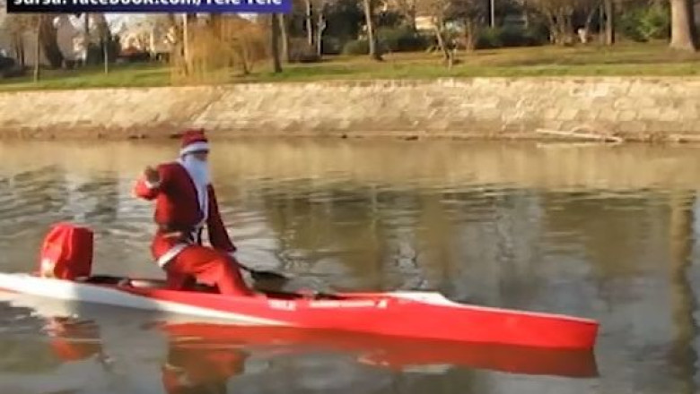 Mos Craciun a venit cu barca pe Bega Imagine