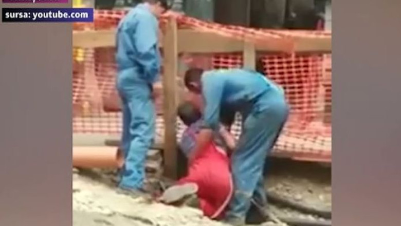 Muncitor cu... susul in jos Imagine