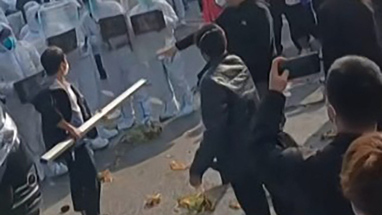 Numar record de cazuri de Covid in China. La Zhengzhou, unde au avut loc proteste la fabrica iPhone, a fost impusa carantina Imagine