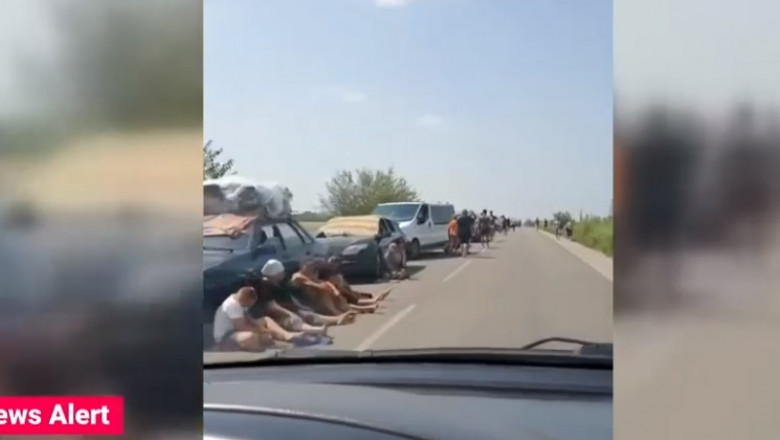 Oamenii din apropierea centralei de la Zaporojie incep sa paraseasca regiunea. S-au format cozi uriase de masini Imagine