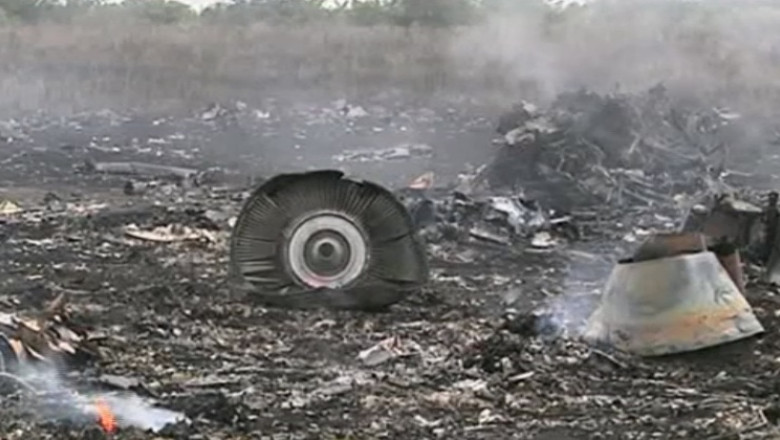 Olanda a identificat toate victimele "straine" ale zborului MH17 doborat in Ucraina Imagine