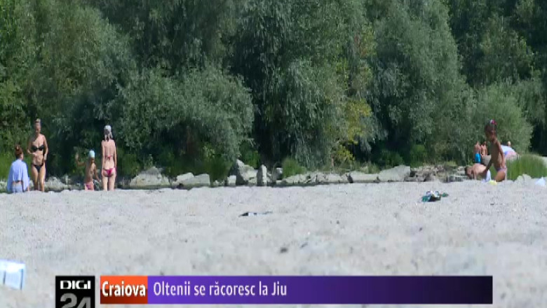 Oltenii se racoresc in Jiu, desi scaldatul este interzis Imagine