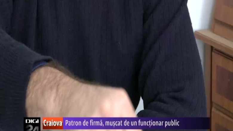 Patron de firma din Craiova, muscat de un functionar public   Imagine