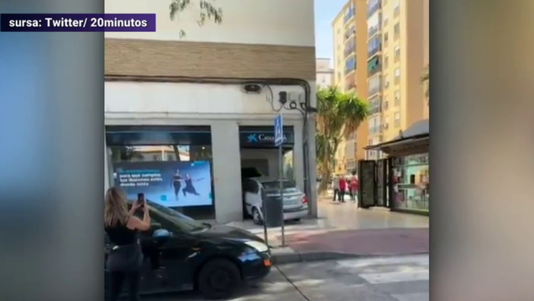 Pentru ca nu a reusit sa scoata bani de la bancomat, un barbat din Spania s-a razbunat si a intrat cu masina in banca Imagine