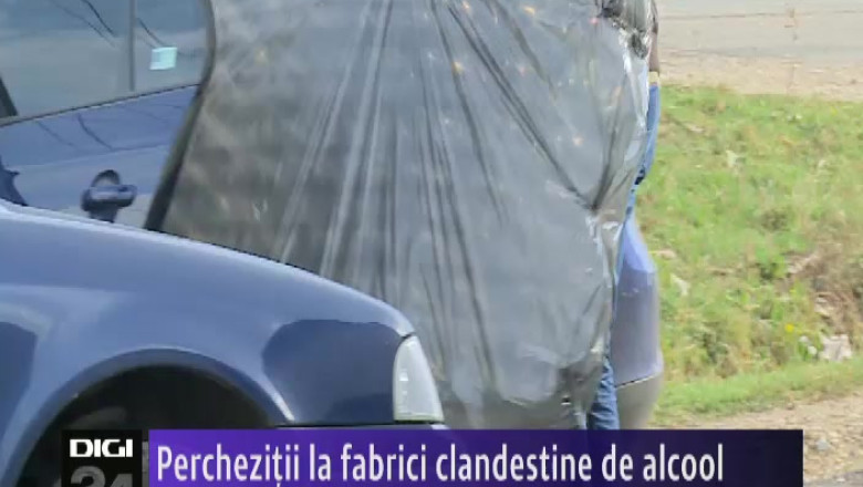 Perchezitii la fabrici clandestine de alcool Imagine