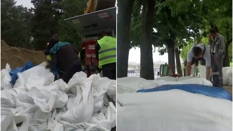 Pericol pe Dunare. Nivelul apei ar putea creste cu peste 8 metri in zilele urmatoare. Saci cu nisip pe malurile fluviului, in Ungaria Imagine