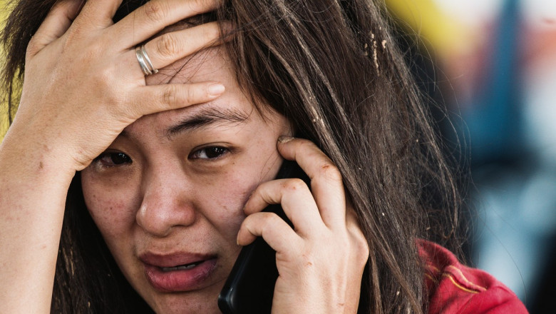 Peste 20 de morti si multi disparuti dupa o alunecare de teren in Malaezia. Salvatorii au gasit "o mama cu copilul ei imbratisati" Imagine
