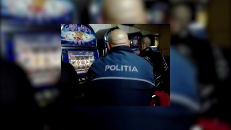 Politistul din Craiova prins la &quot;pacanele&quot;, pedepsit   Imagine