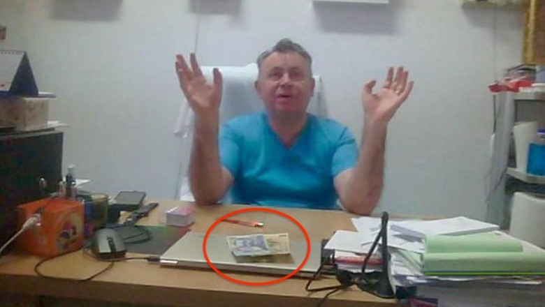 Primele imagini cu bani pe biroul din cabinetul medical al lui Nelu Tataru Imagine