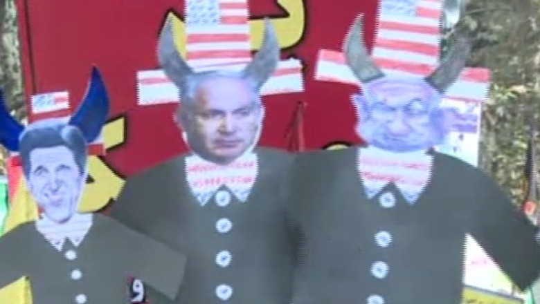 Proteste violente la Teheran. Mii de iranieni au scandat sloganuri antiamericane si au ars drapelul SUA Imagine