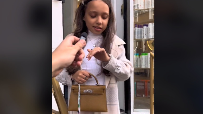 "Fiica miliardarului" de pe TikTok. Imagini virale cu o fetita de 11 ani care pozeaza in tinute de lux si un ceas de 124.000 de dolari Imagine