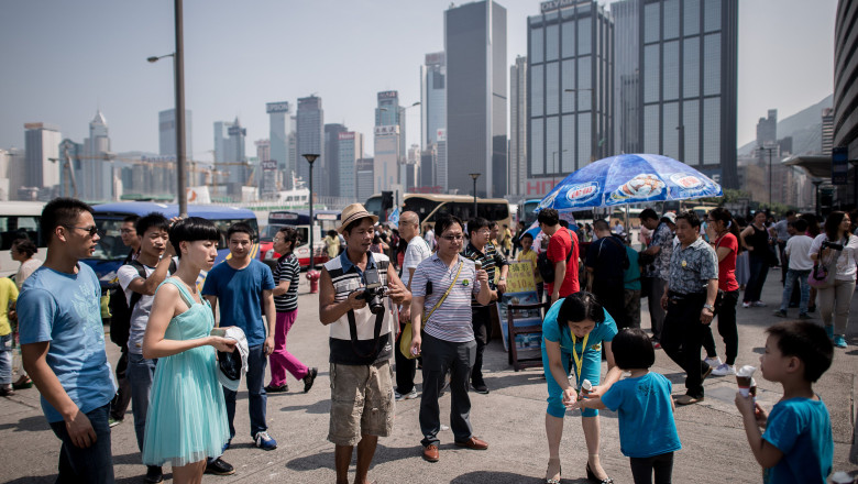 Reguli de purtare. Oficialii chinezi vor ca turistii sa se comporte civilizat in afara tarii Imagine