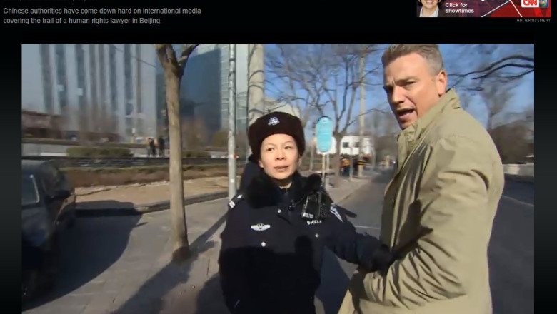 Reporteri ai CNN si BBC, bruscati in direct, la procesul unui activist chinez Imagine