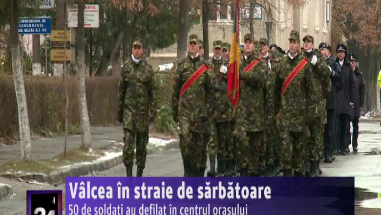 Rm. Valcea, in straie de sarbatoare. 50 de soldati au defilat in centrul orasului   Imagine