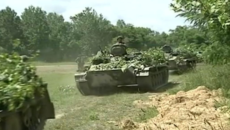 Rusia anunta retragerea trupelor de la granita cu Ucraina Imagine