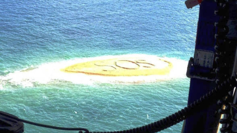 Salvare ca-n filme: Un mesaj SOS scris pe nisipul unei insule pustii din Pacific duce la recuperarea a cinci naufragiati Imagine