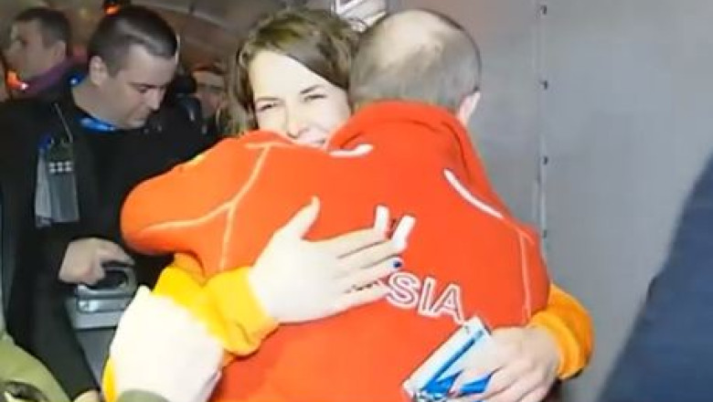 SOCI 2014. Vladimir Putin a imbratisat si felicitat o sportiva lesbiana din Olanda Imagine