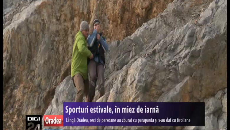 Sporturi estivale, in miez de iarna. Zeci de oradeni au zburat cu parapanta si s-au dat cu tiroliana Imagine