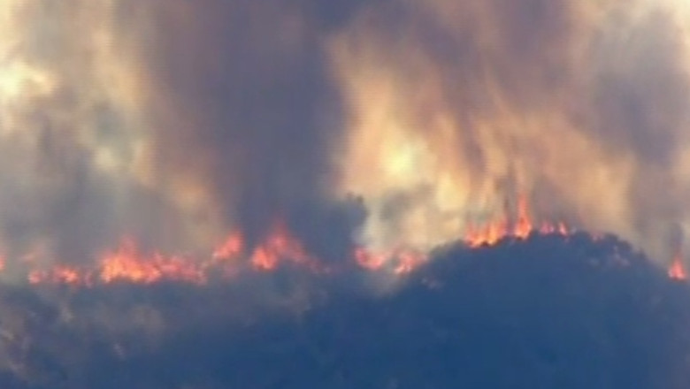 Statele Unite se confrunta cu incendii de proportii, dar si cu inundatii Imagine