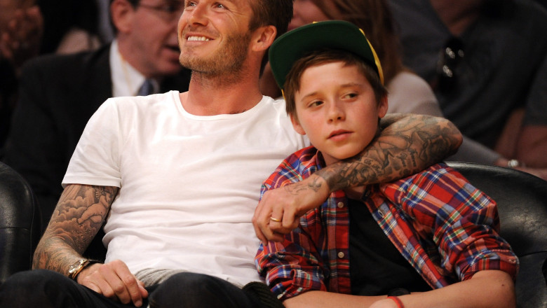 Sute de haine si pantofi ale sotilor Beckham, vandute pentru Filipine Imagine