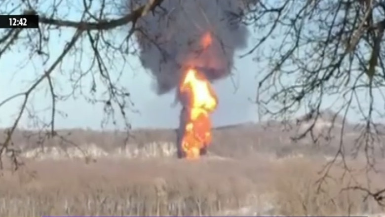 Tren deraiat in SUA. Sase vagoane pline cu titei au luat foc dupa ce au iesit de pe sine Imagine