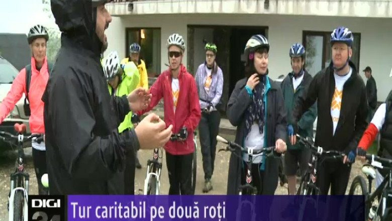 Tur caritabil pe doua roti  Imagine